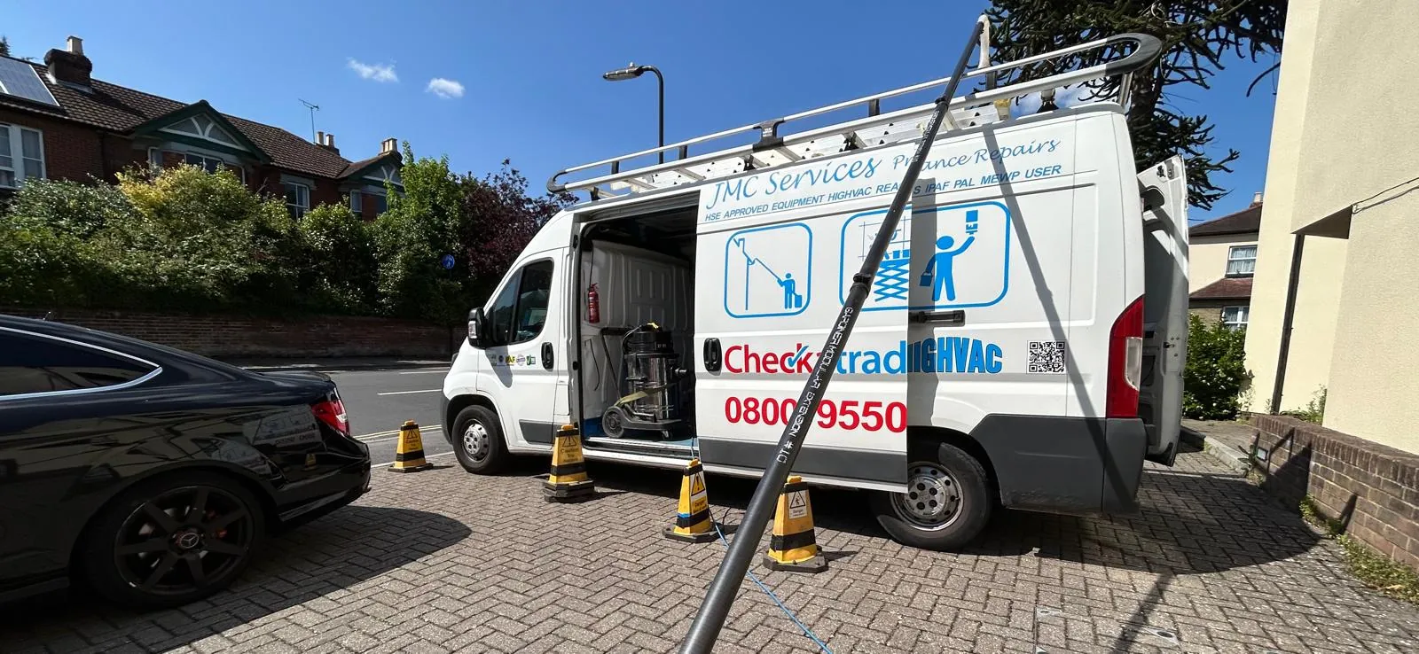 JMC HIGHVAC van and reach-cleaning equipment on site